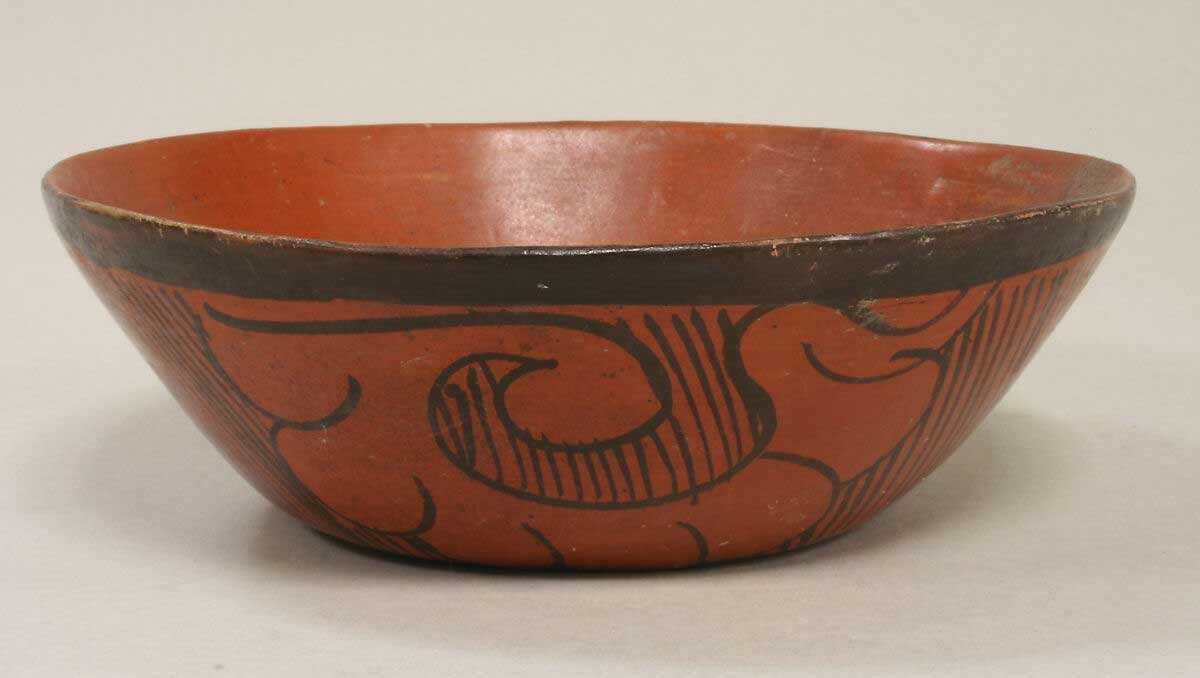 aztec black on orange ceramic bowl