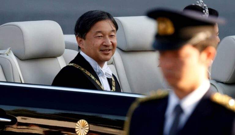 emperor naruhito in vehicle with sescurity