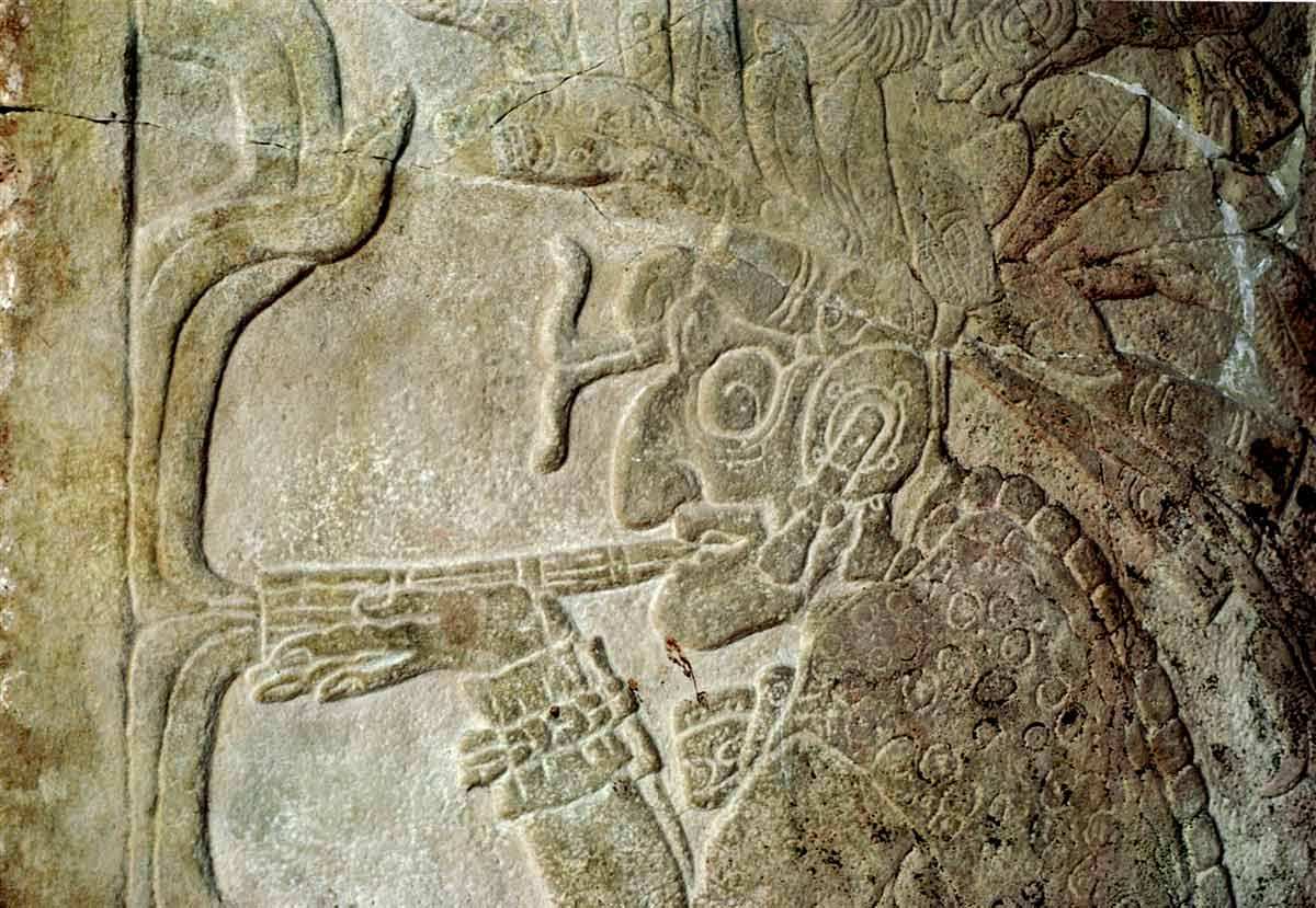 mayan priest smoking cigar palenque