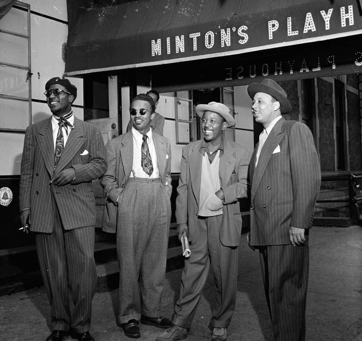 Thelonious Monk, Howard McGhee, and Roy Eldridge, with Teddy Hill, outside Mintons Playhouse, 1947