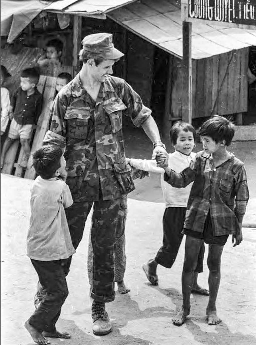 us marine cap south vietnam village children photo